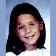 Minor witness's identity protected Pixelated photo of smiling tween girl with long dark hair